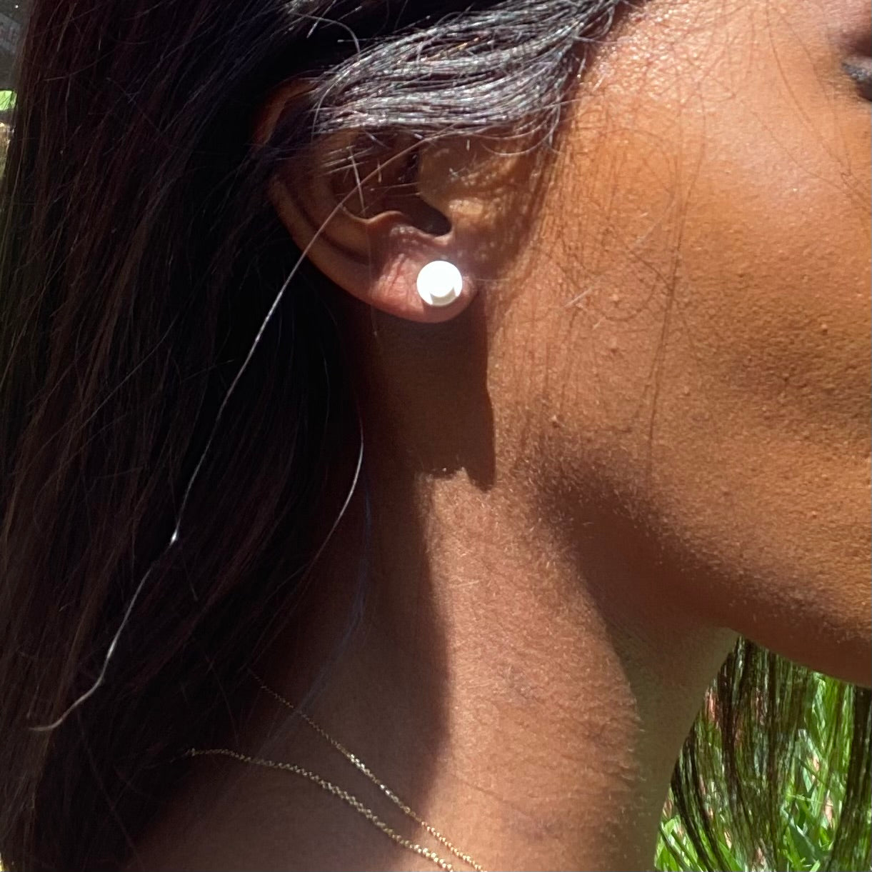 Puces d'oreille avec une brique Lego ronde