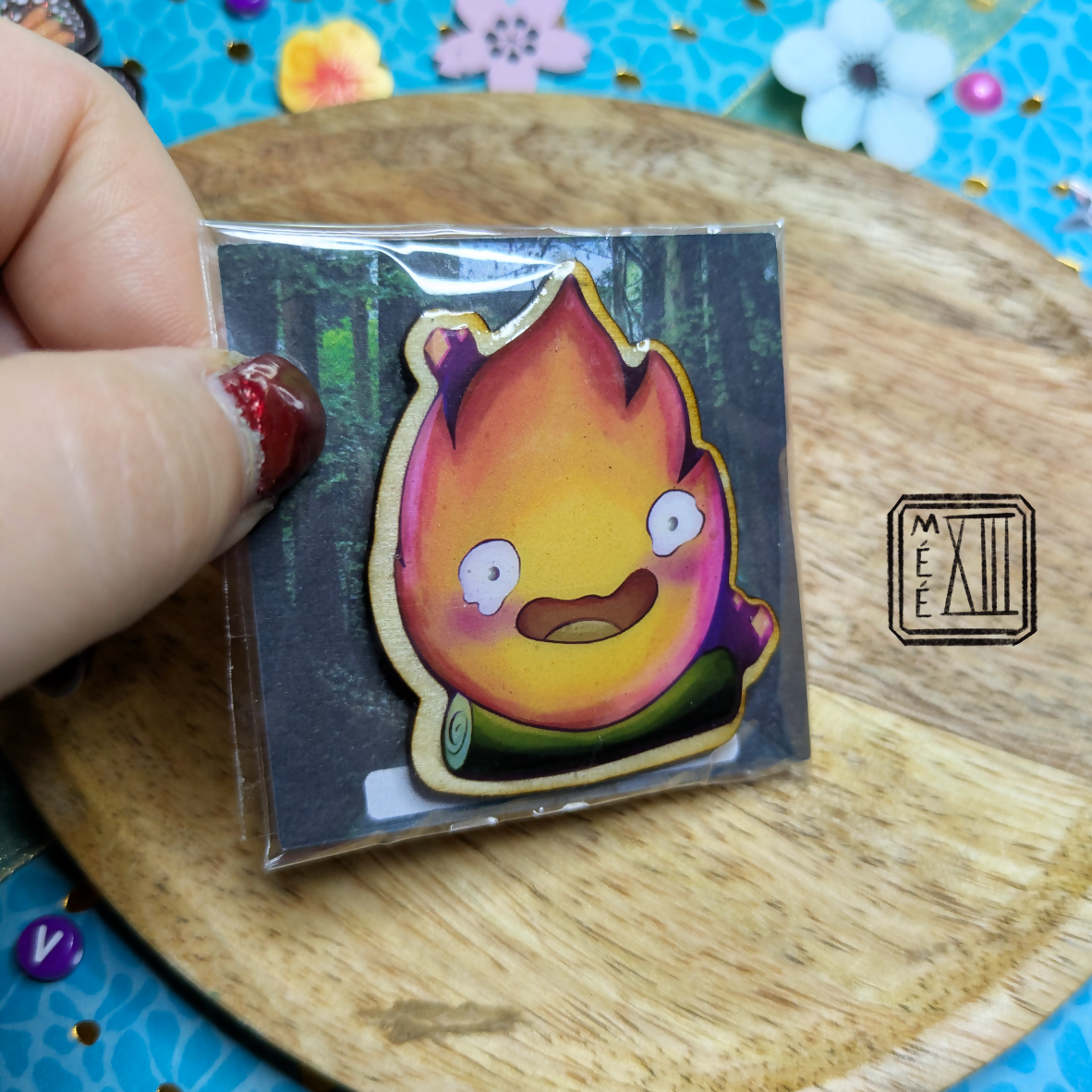 Pin's en bois artisanal flamme vivante
