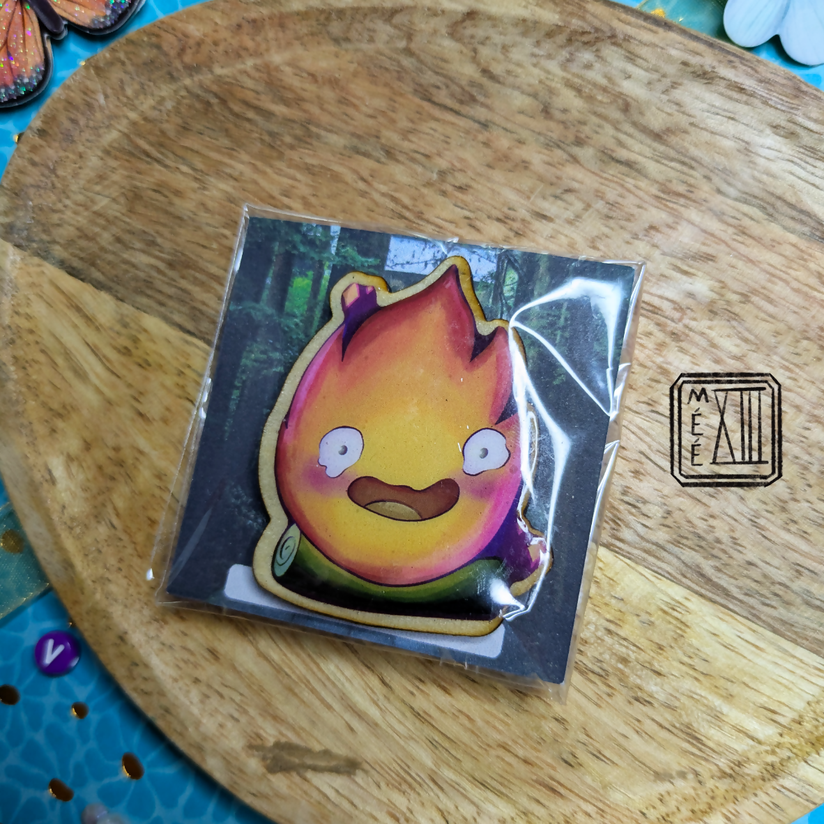 Pin's en bois artisanal flamme vivante