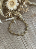 Bracelet with large mother-of-pearl beads & small gold beads