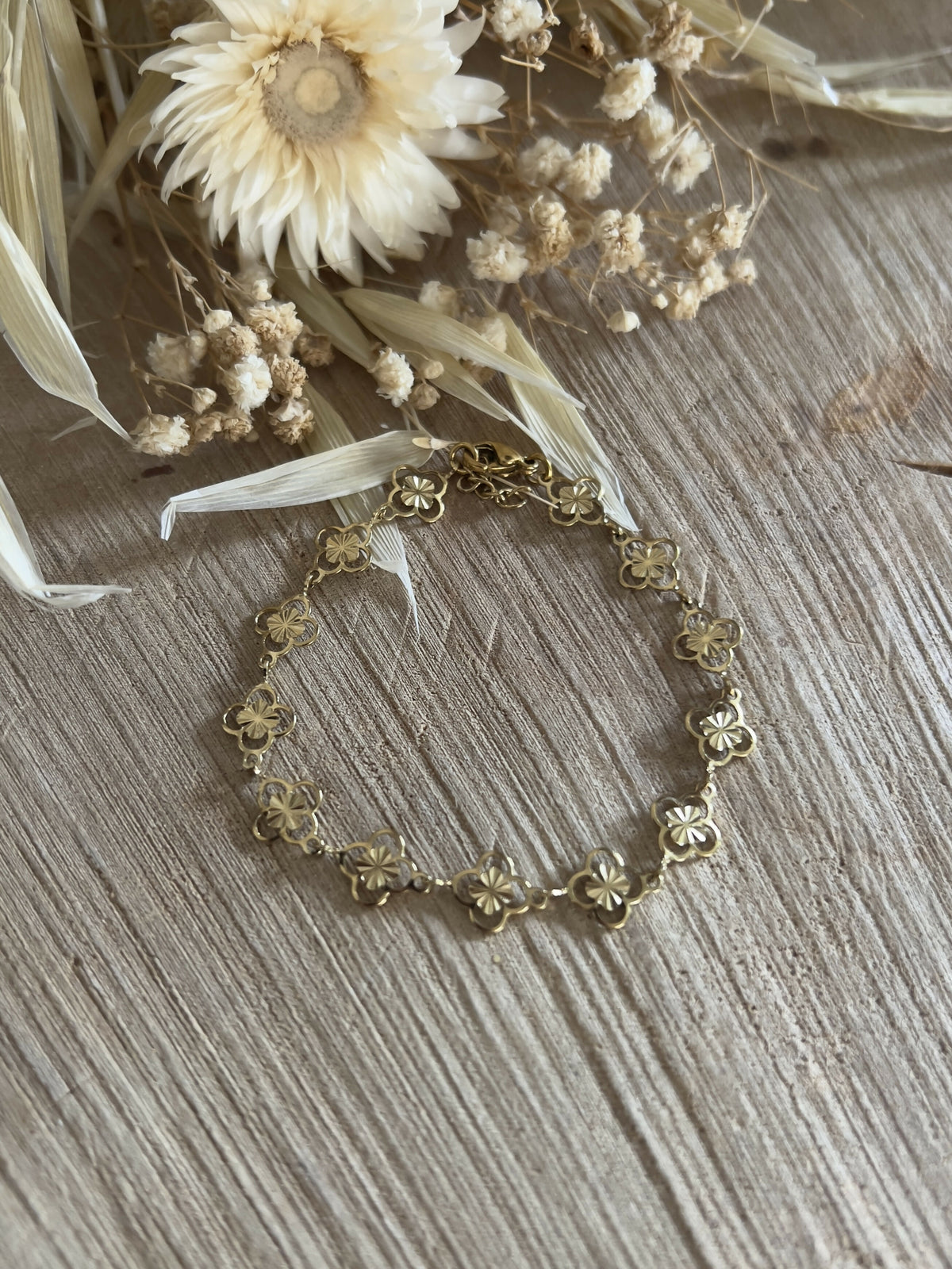 Bracelet with large mother-of-pearl beads & small gold beads