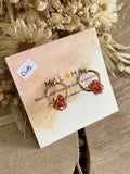 Créoles CLIPS fleurs verre rose