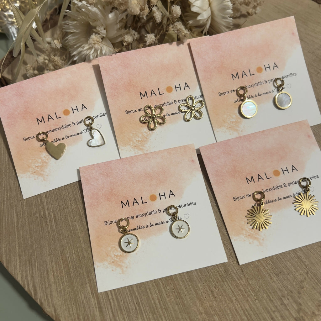 Pendant drops for interchangeable hoop earrings