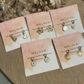 Pendant drops for interchangeable hoop earrings
